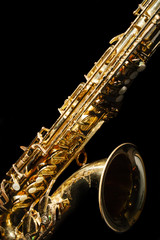 Fototapeta premium Saxophone isolated on black background