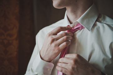 The businessman dresses a shirt 2084.