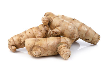 fresh turmeric on white background