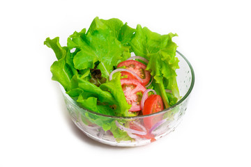 Fresh vegetable salad isolated on white