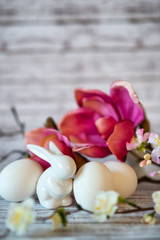 Rabbit Figurine with White Eggs and Flowers