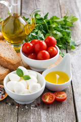 delicious mozzarella and ingredients for a salad, vertical