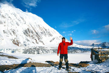 hiker at the top of a pass