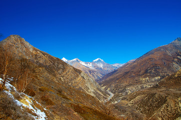 Snow capped mountains.