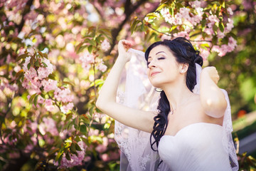 Obraz na płótnie Canvas bride, veil, trees, flowering