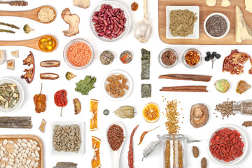 Naklejka premium various superfood on white background top view