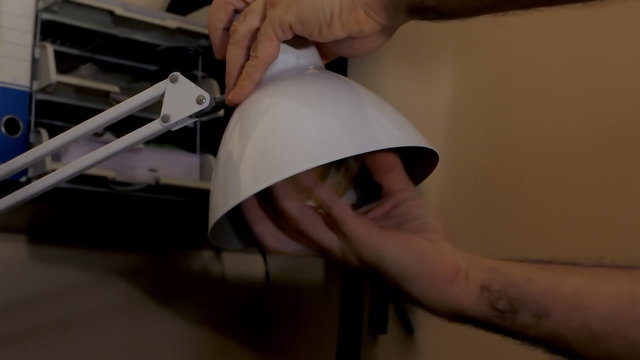 Replacing old lightbulb with eco light