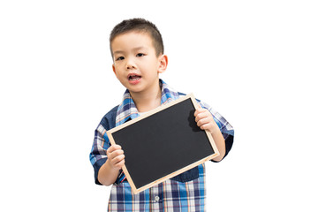 Obraz premium Little asian boy holding a blank blackboard