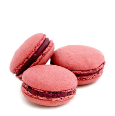 colorful macaroons over white background