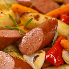 Roasted Potato and Sausage Dinner. Macro. Selective focus.