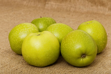 Six small green apple