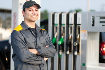 Smiling gas station worker