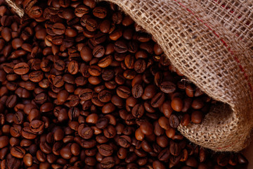 Coffee beans in a burlap bag