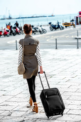 Woman with travel bag