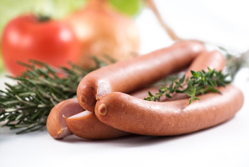 three german sausage and herbs that were used to prepare them