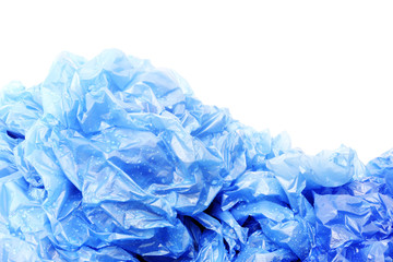Blue plastic garbage bags with water drops
