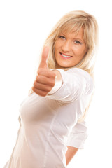 Mature woman giving thumbs up sign isolated