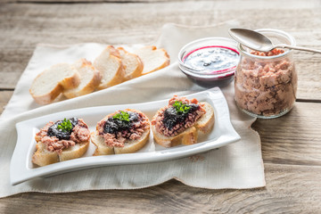 Sandwiches with pate and berry jam