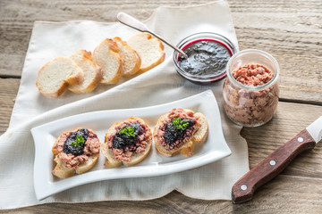 Sandwiches with pate and berry jam
