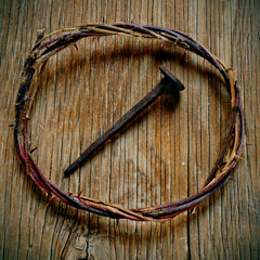 the crown of thorns of Jesus Christ and a nail on the Holy Cross