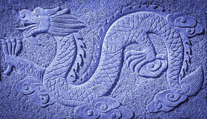 Chinese blue dragon carved in the rock