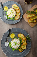 Grilled camembert with herbs, baquettes