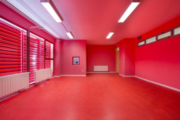 Empty classroom, red.