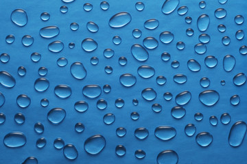 drops of water on a blue background