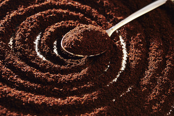 teaspoon with ground coffee