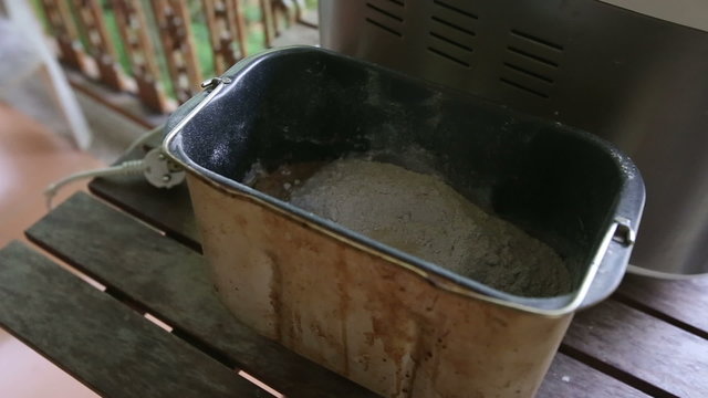 caucasian woman sets container with dough ingredients baking 