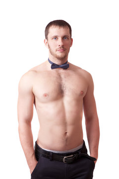 Man with naked torso and a bow tie