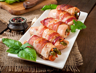 Delicious chicken rolls stuffed with green beans and carrots 