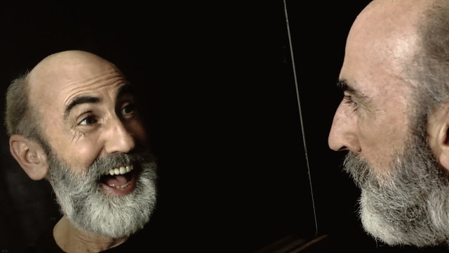 Schizophrenia split personality smiling serious