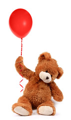 Sweet teddy bear holding a red balloon - obrazy, fototapety, plakaty