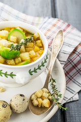 Homemade soup with brussels sprouts and croutons