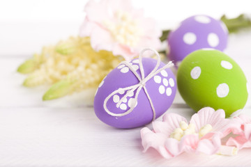 easter background with eggs and flowers