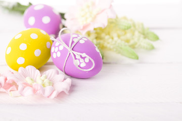 easter background with eggs and flowers