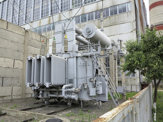 Huge industrial high-voltage substation power transformer on rai