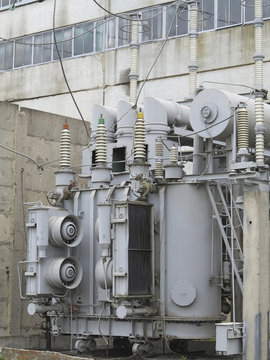 Huge industrial high-voltage substation power transformer on rai