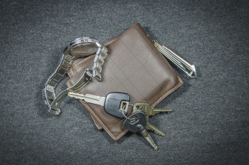 Wallets and car key of wristwatch have clippers