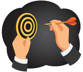 Hand with a dart is aiming at a dartboard on a dark background