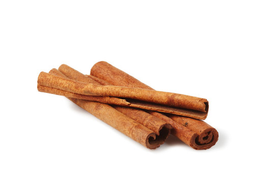 Three cinnamon sticks isolated on white