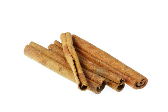 Some cinnamon sticks isolated on white