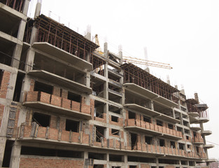 Construction site with crane and building