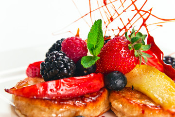 pancakes with apples and  berries