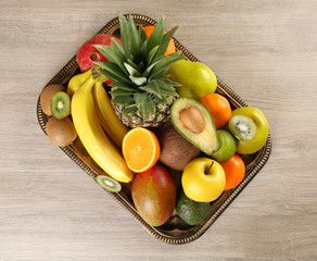 Assortment of fruits on wooden table
