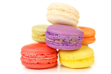 Tasty colorful macaroons isolated on white