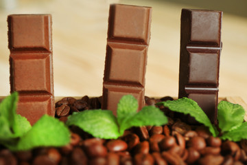 Still life with set of chocolate in wooden box of coffee