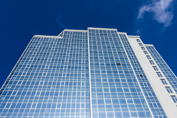 Fototapeta premium The glass facade of a tall building