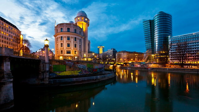 Timelapse - Urania and UNIQA Tower at the Danube Canal Vienna